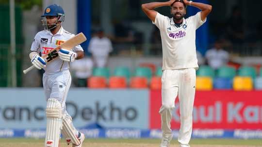 Unyielding Dinusha, spirited tail hold off India to save Colombo Test